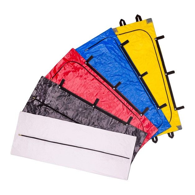 Body bags in white, black, red, blue and yellow, fanned out